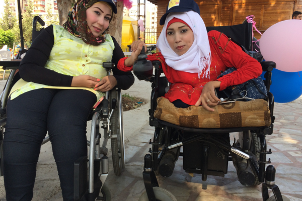Two refugees with disabilities