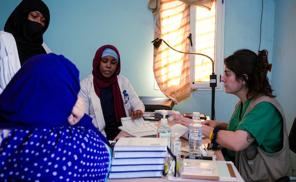 group of humanitarian aid workers collaborating