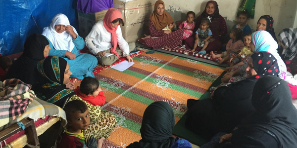 A group of women participating in a livelihoods assessment in one of the five Iraqi villages.  